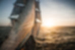 Old tall ship sails backlit.jpg