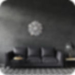 Thumbnail: The Sirus silver wall clock - above black sofa