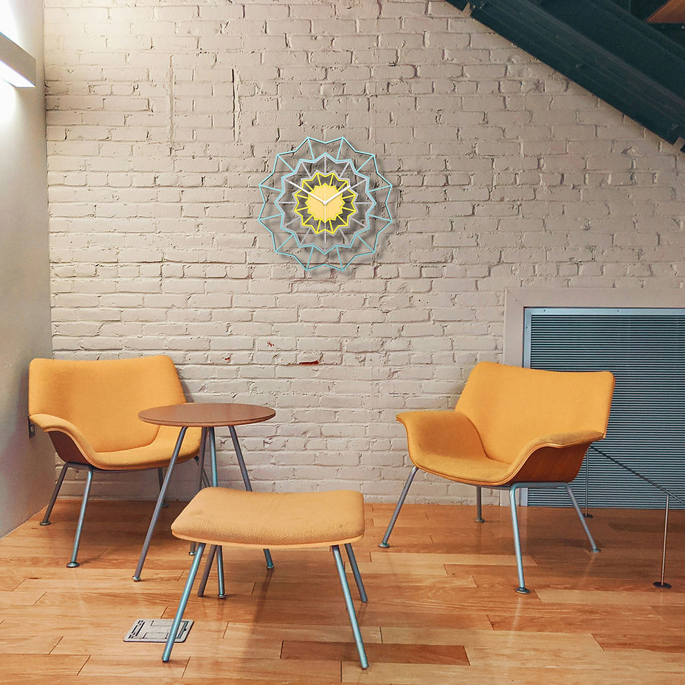 Thumbnail: Chevron Nordic attractive modern farmhouse wall clock - behind orange chairs