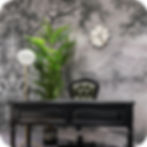 Handmade silver Origami wall clock with 3D look - on grey wallpaper