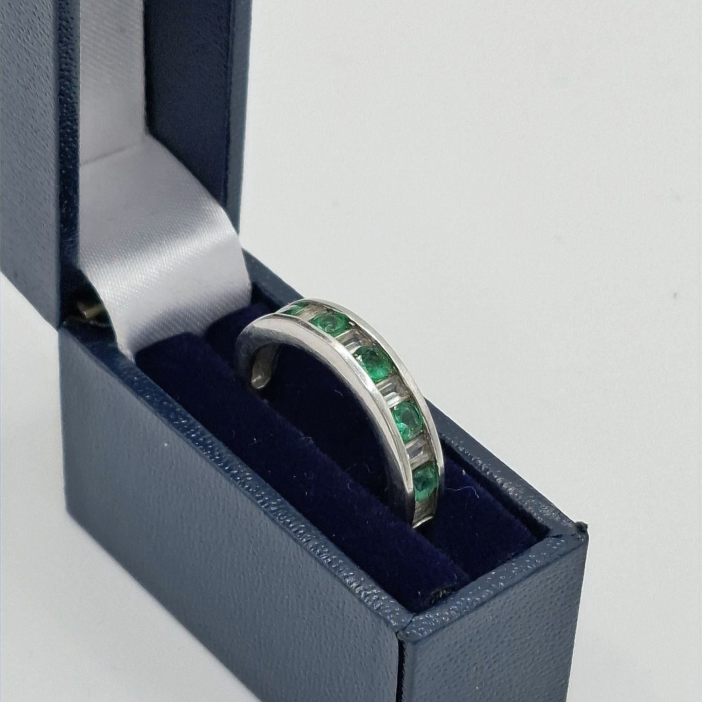 Emerald and White Topaz Half Eternity ring in Sterling Silver