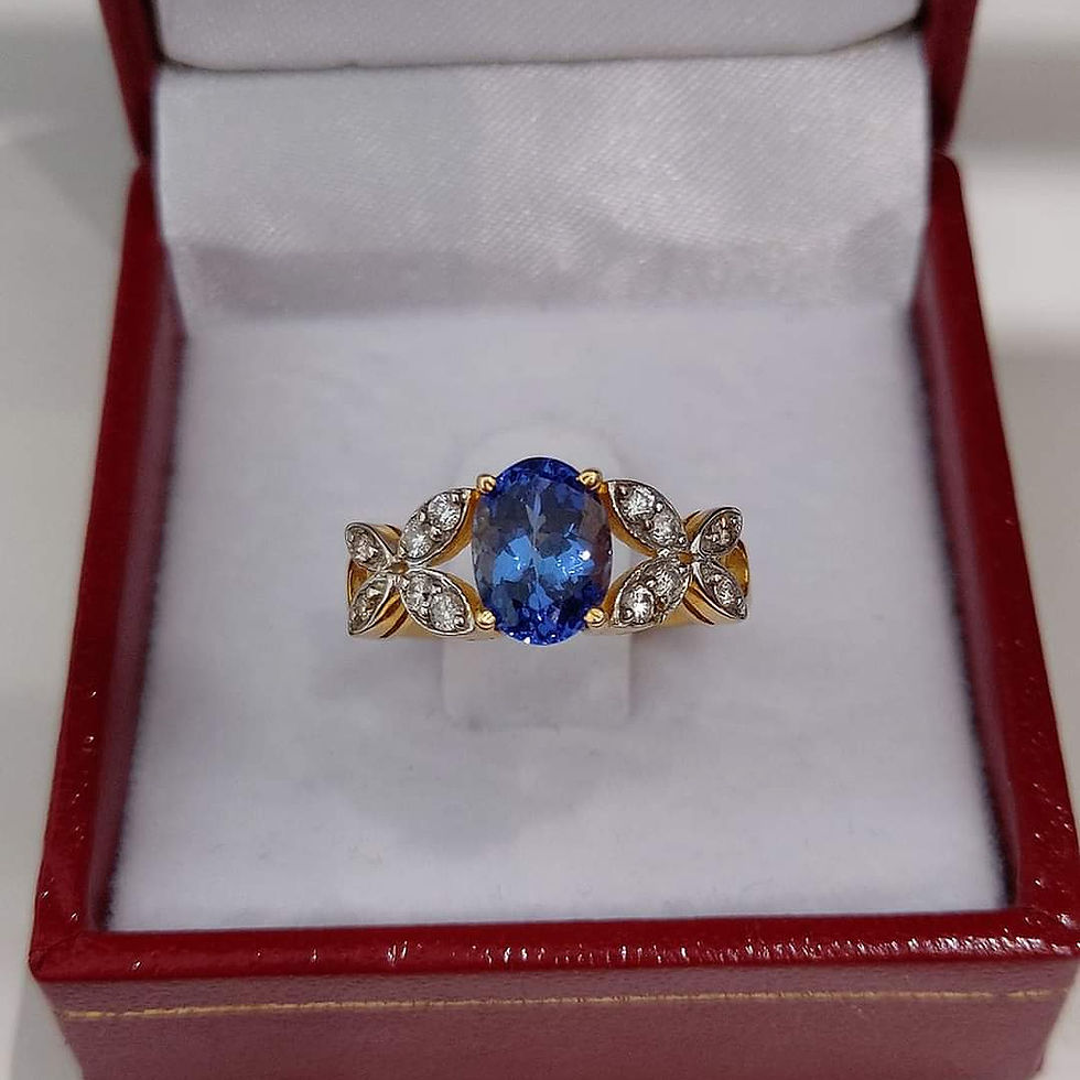 Thumbnail: Tanzanite and Diamond 14k Yellow Gold ring