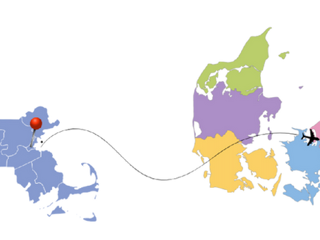 An image of the state of Massachusetts, USA with a pin where Boston is. There is then a line with an airplane connecting Boston to a pin where Copenhagen would be on a map of Denmark.