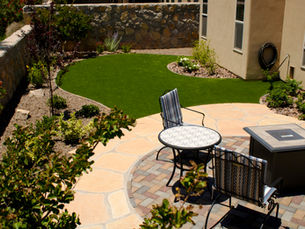 Desert landscaping with drought-tolerant plants and gravel in Las Cruces, New Mexico