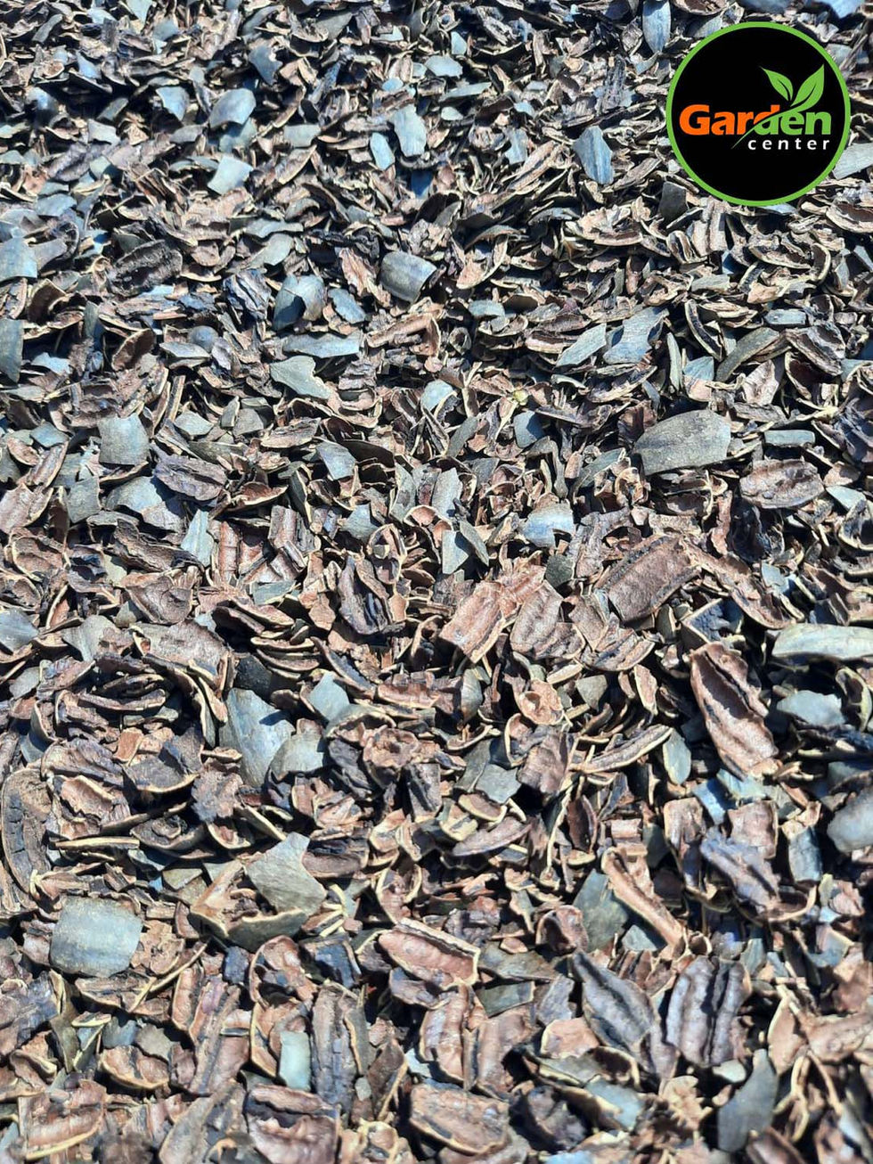 Natural pecan shell mulch for landscaping and soil coverage, available at Garden Center.