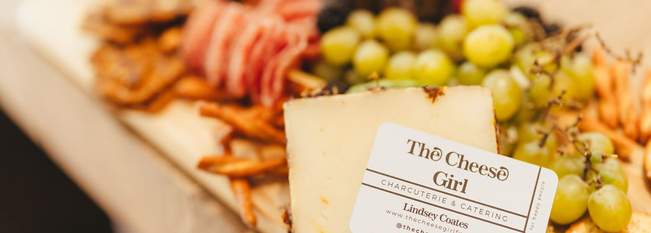 charcuterie board with business card 