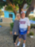 Photo of Jose Rivera and Betzy Alvalle, the owners of Betzy Village. They transformed their retirement home into a beautiful retreat after running a beloved restaurant in Puerto Rico. Betzy curated the landscape with care before her passing in 2023, and Jose now shares the serene space with visitors, honoring her memory.