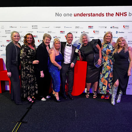 Representatives of PCP, DCC and Health Squad look happy while proudly showing their award