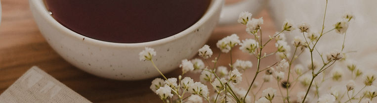white ceramic mug with brown liquid_edit