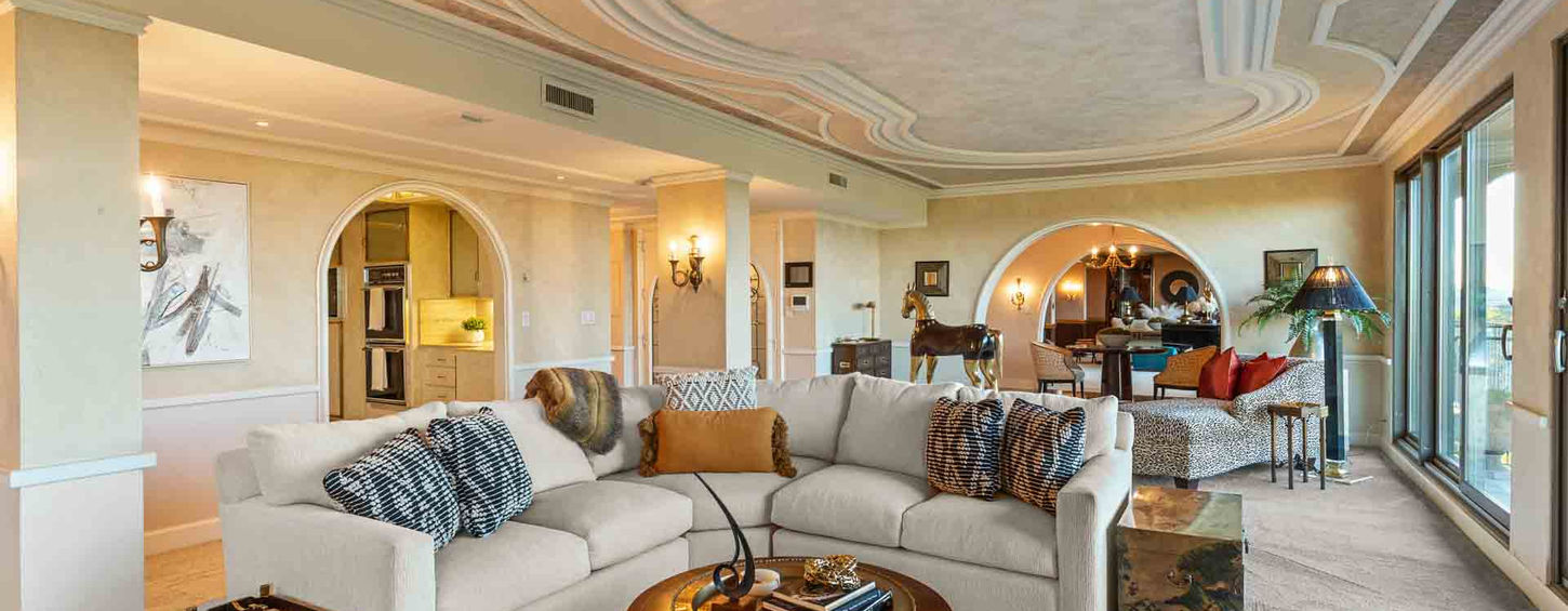 Sacramento contractor project — living room with arched doorways and ceiling detail