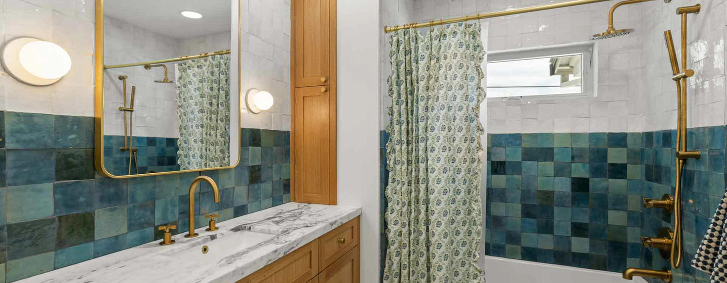 Sacramento contractor project — bathroom remodel with green tile and gold fixtures