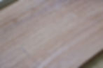 Close up of a piece of mahogany wood.