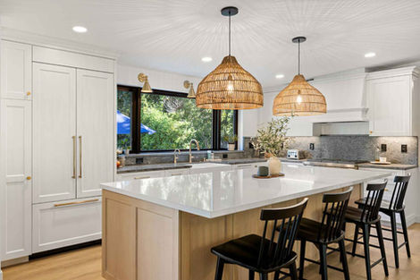 Spacious kitchen counter with quartz surfaces and clean modern finishes in the Fair Oaks remodel.