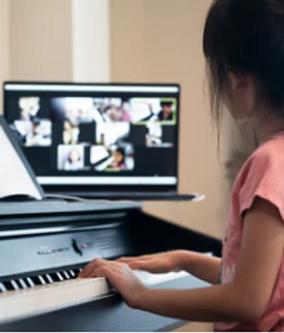girl playing piano.PNG