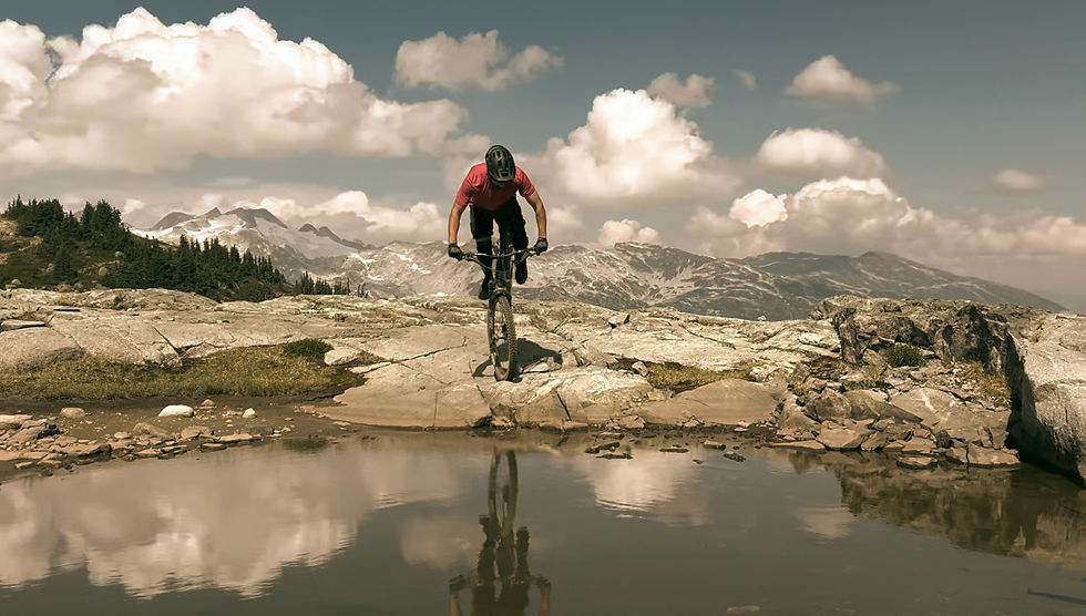Mountain biker on Sootip Mountain, British Columbia, Canada
