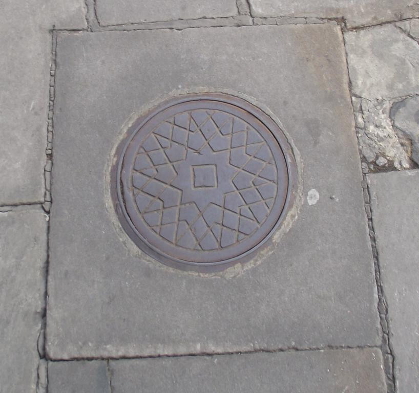Coal plate outside the Viaduct Tavern immediately above one of the "cells"