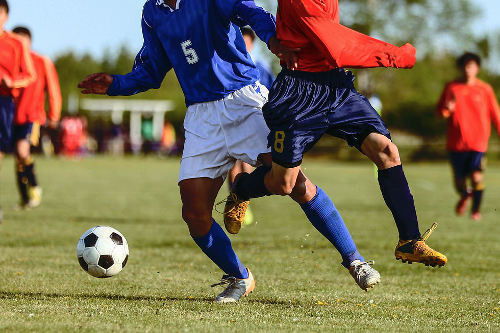 Soccer Players Competing