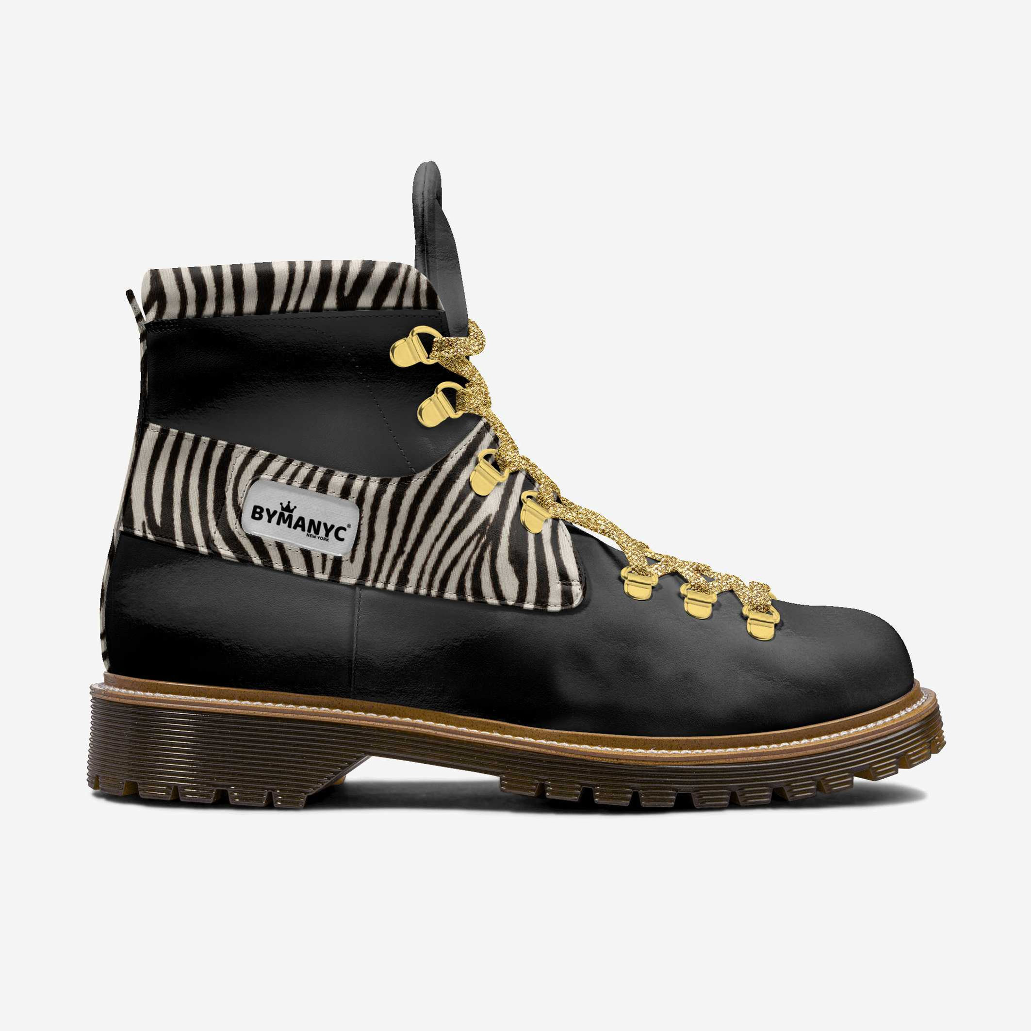 Black hiking boot BYMANYC with zebra print and yellow laces.