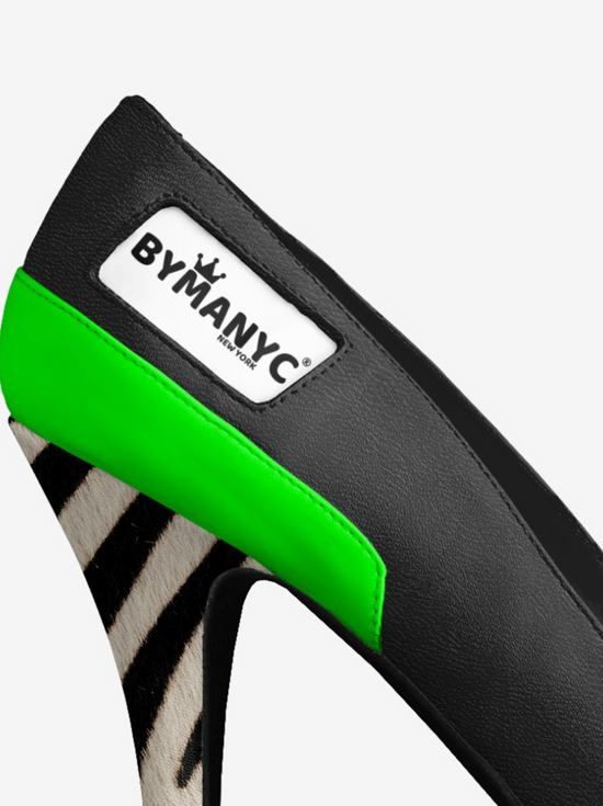 Black high-heeled shoe with BYMANYC label, neon green, zebra print heel.