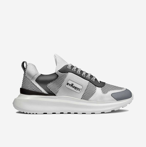 White and grey modern sneaker with BYMANY logo on side.