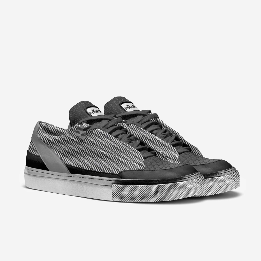 Textured grey and black sneakers with white soles.