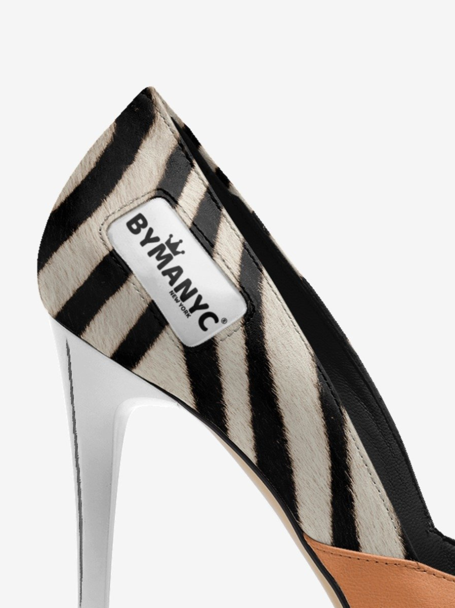 Miniatura: Close-up of stylish zebra print stiletto heel with BYMANYC brand tag.