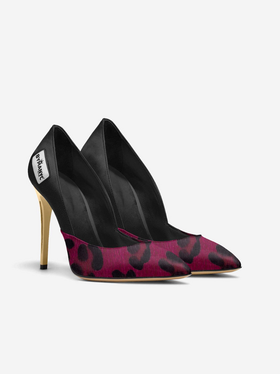 Pink and black leopard print BYMANYC high heels with gold stiletto.