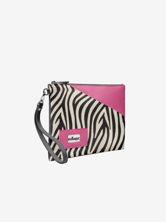 Zebra print clutch bag with pink panel and "unleashed" label.