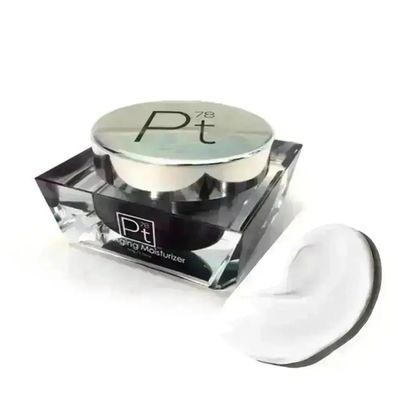 Silver Pt Platinum cream jar with clear base and white dollop.