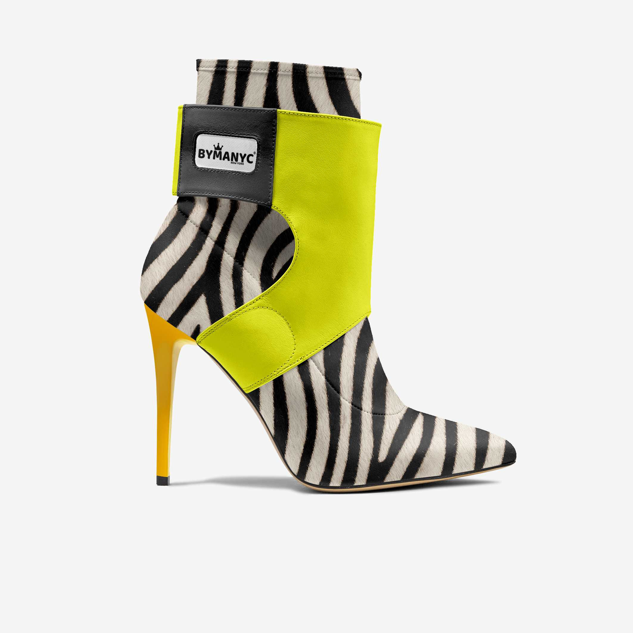 Zebra print ankle boot with neon yellow accent, BYMANYC, and stiletto heel.
