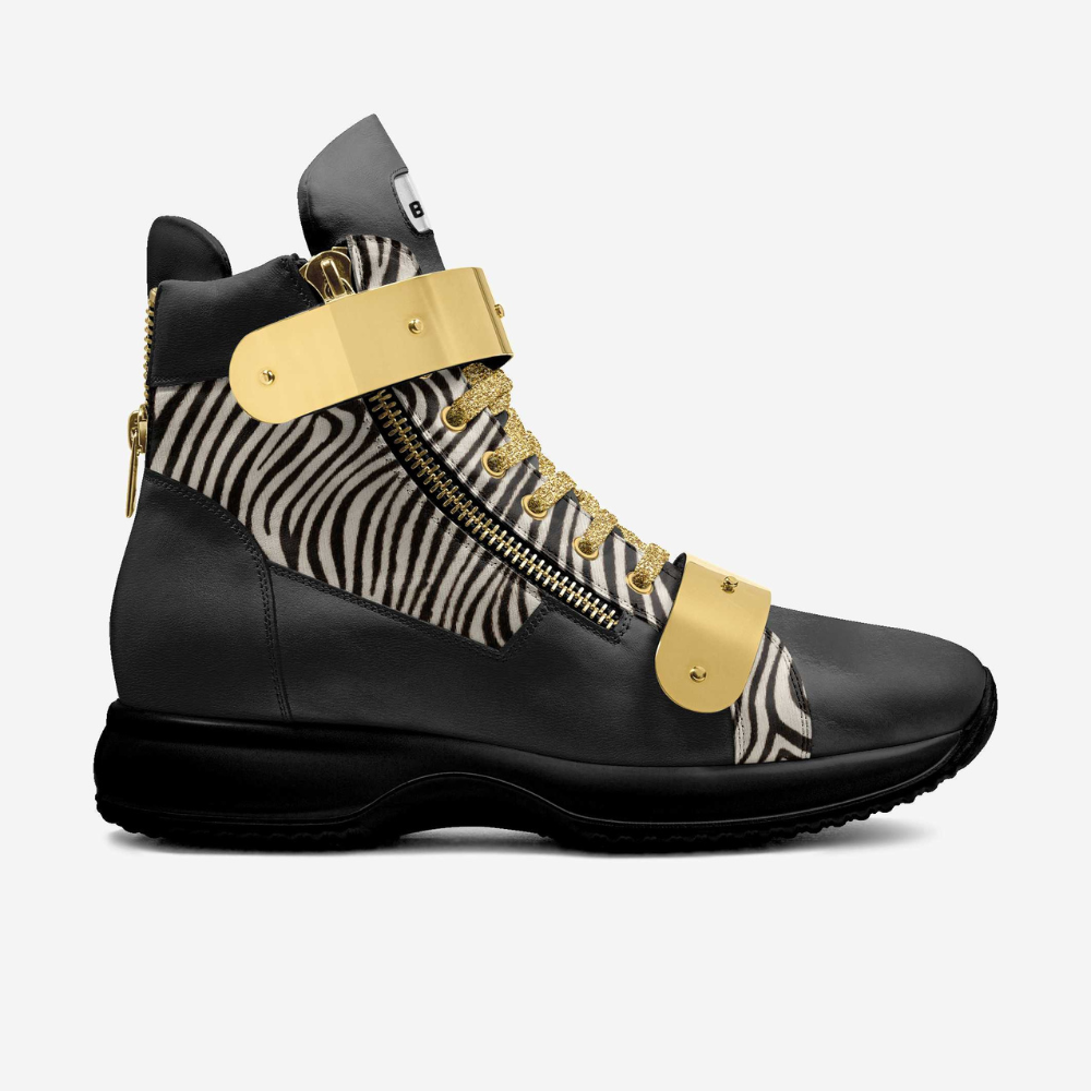 Black leather high-top sneaker with zebra print and gold accents.