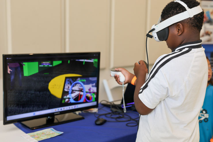 An artist creating digital art on a screen, showcasing creativity and innovative design software.