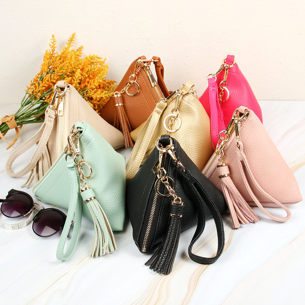 Thumbnail: Pyramid Shape Tassel Wristlet Leather Bag