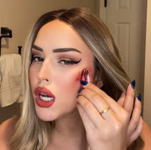 A woman uses a used tampon as a beauty product.