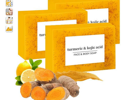 Turmeric and kojic acid glow skin bar with fresh turmeric roots and powder, a natural skincare product.