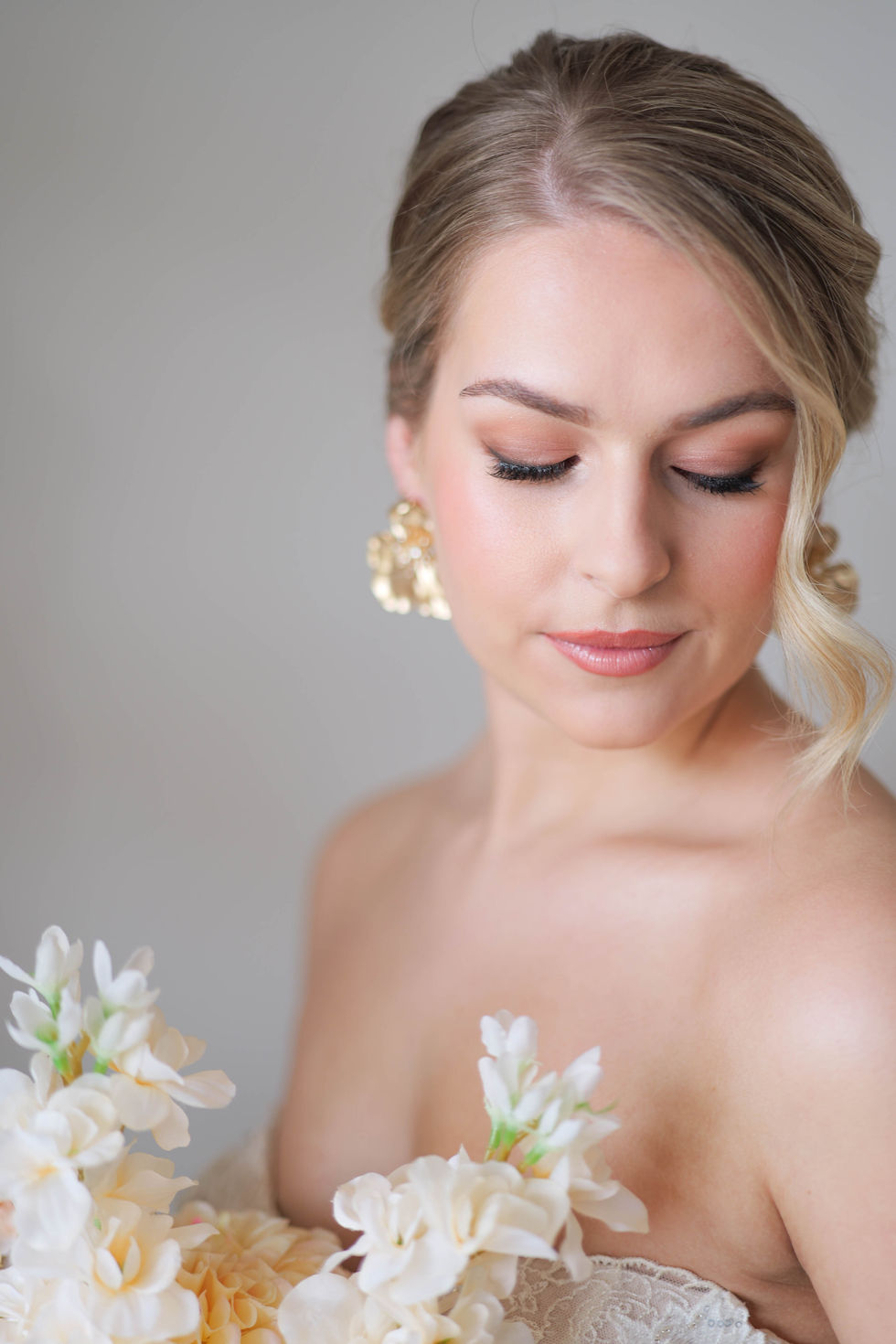 a close up of a woman 's face with her eyes closed