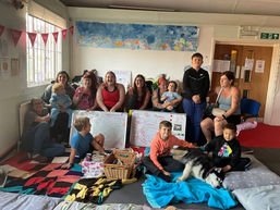Physical Empowerment group with kids and dogs