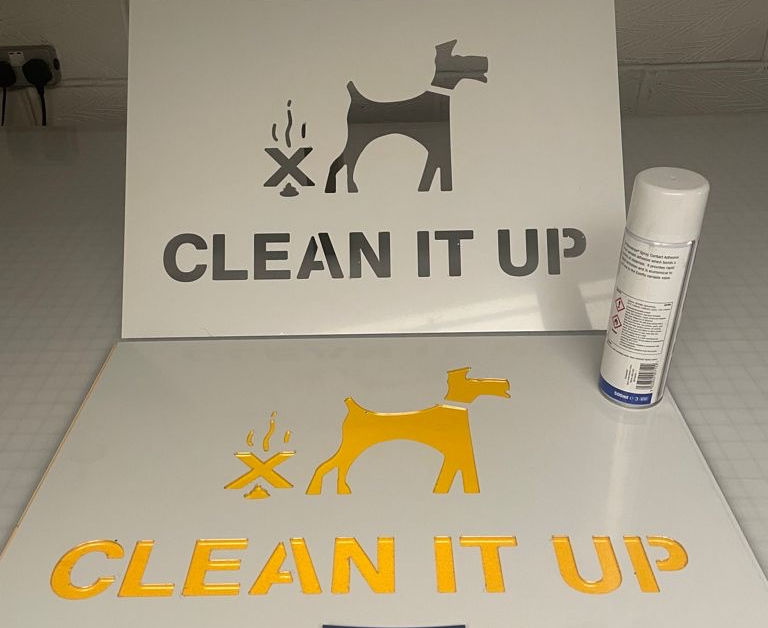 Stainless steel fret cut stencil used over and over again to get across a simple message Clean it Up