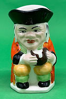 Ordinary Toby jug medium orange - Keele Street Pottery circa 1950