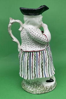 Female Snufftaker toby jug - Staffordshire circa 1820