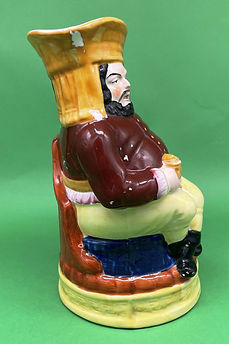 Falstaff toby jug - Staffordshire red jacket