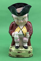 Hunchback Toby jug large maroon - Sitzendorfer circa 1920
