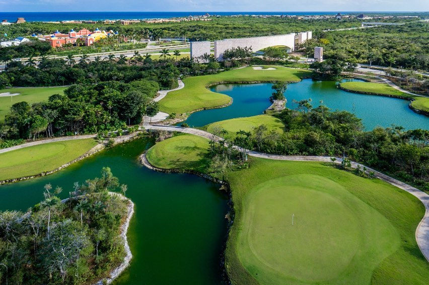 Aerial view of Tulum Country Club golf course and luxury real estate community