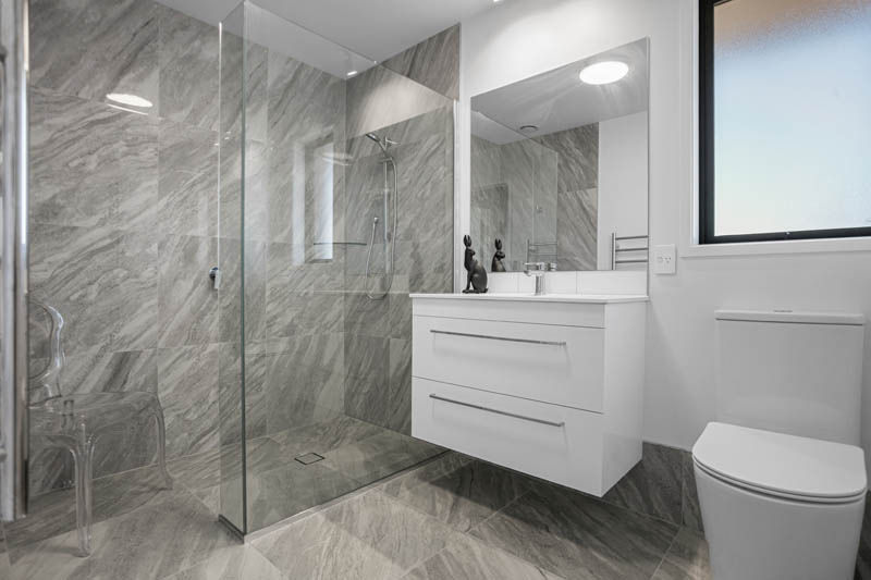Modern tiled bathroom with walk in shower Villa 127 Longridge Country Estate