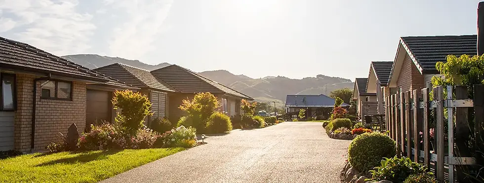 Villas at Longridge retirement village in Paeroa with garden and Coromandel Ranges backdrop