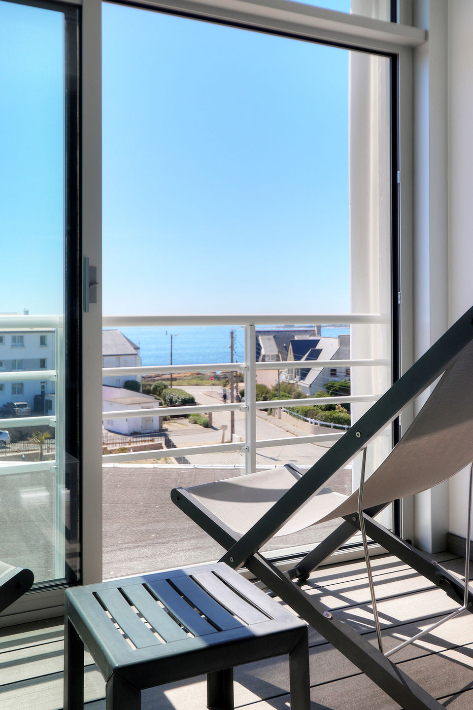 Balcony with lounge chairs and unobstructed view in Deluxe Room at the Hôtel Le Bellevue Quiberon