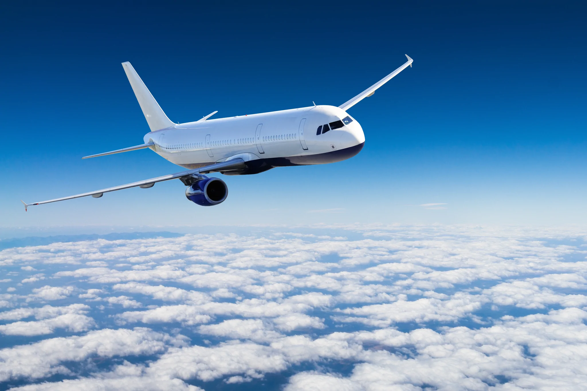 plane_in_sky_x1366.webp