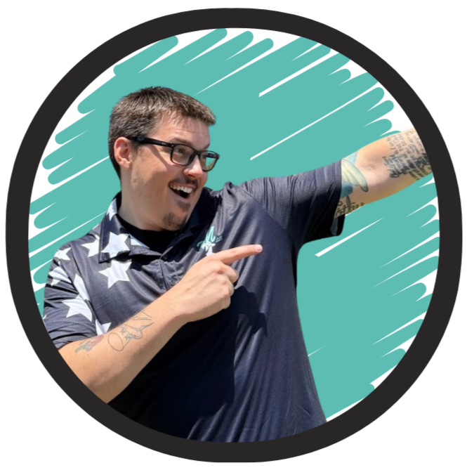 Jared Swan in star-patterned Dab Marketing shirt points and smiles energetically. Tattoos visible, aqua scribble background, cheerful mood.