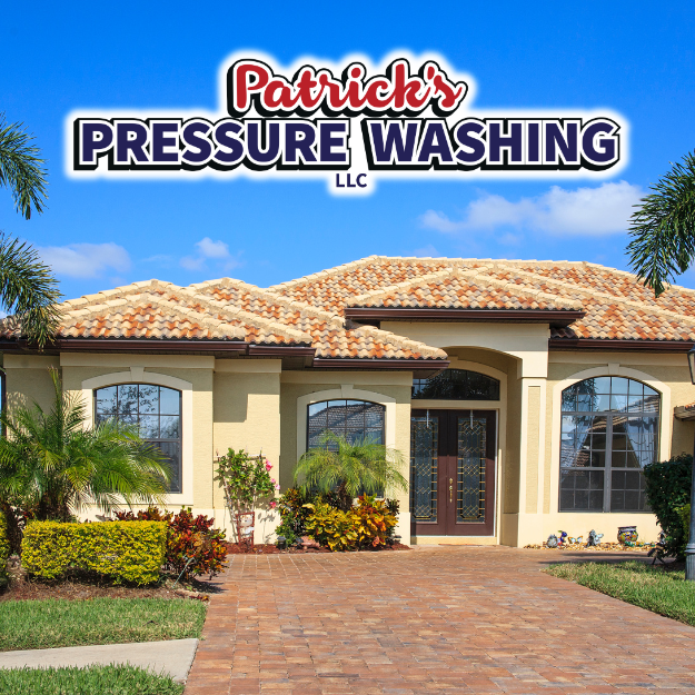 Patricks pressure washing logo inf ront of freshly cleaned home with clean roof clean pavers and more by Patrick's Pressure Washing.
