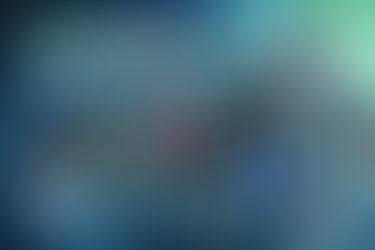 Man pressure washing, wearing custom gear. Various shirts displayed, featuring colorful designs and text. Emphasizes no minimum orders. Dab Marketing Chemical resistant shirts. pefect wash gear for pressure washing and soft washing professionals. 